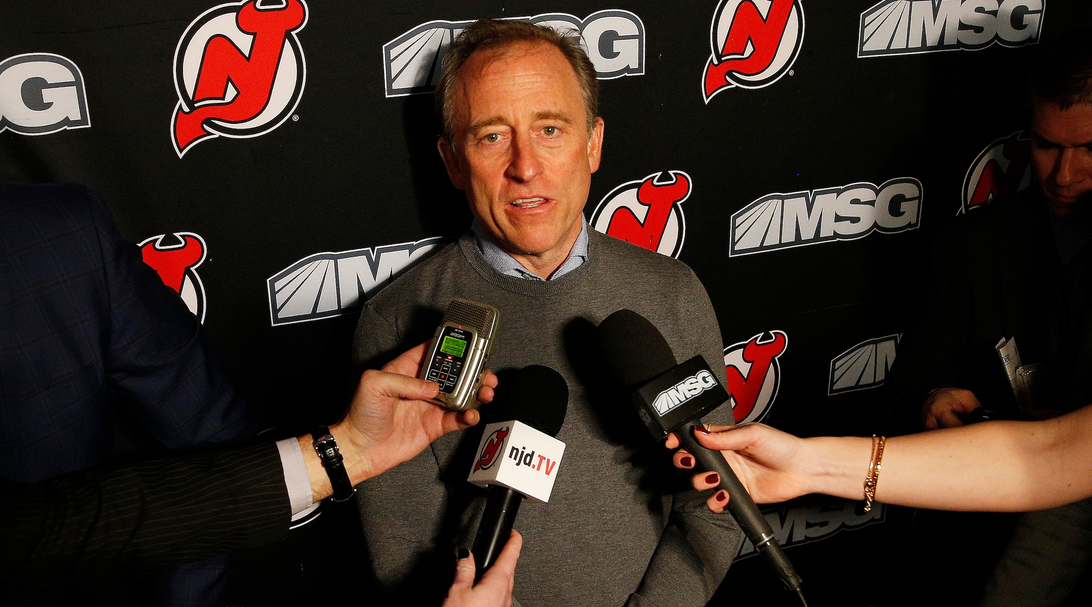 Josh Harris addresses the media at the Prudential Center in Newark, Jan. 12, 2020. (Andy Marlin/NHLI via Getty Images)