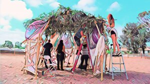 An illustration showing a group of people building a sukkah outside.