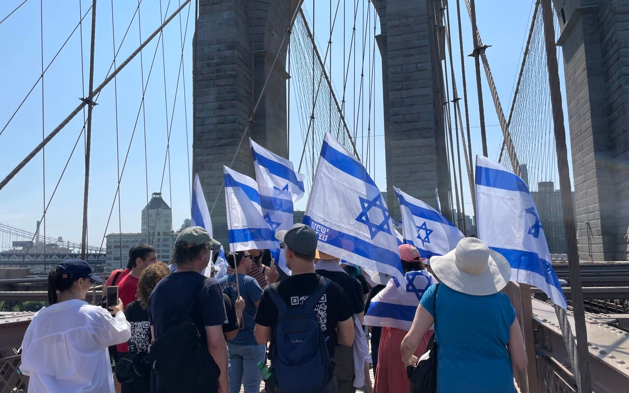 Israelis and their allies march over the Brooklyn Bridge to protest Israel’s right-wing government, July 23, 2023. (Philissa Cramer)
